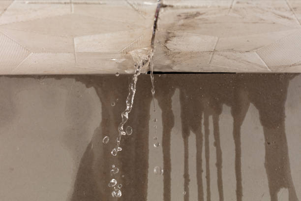 Professional Flood Damage Cleanup technician working in Sandy Hook, CT